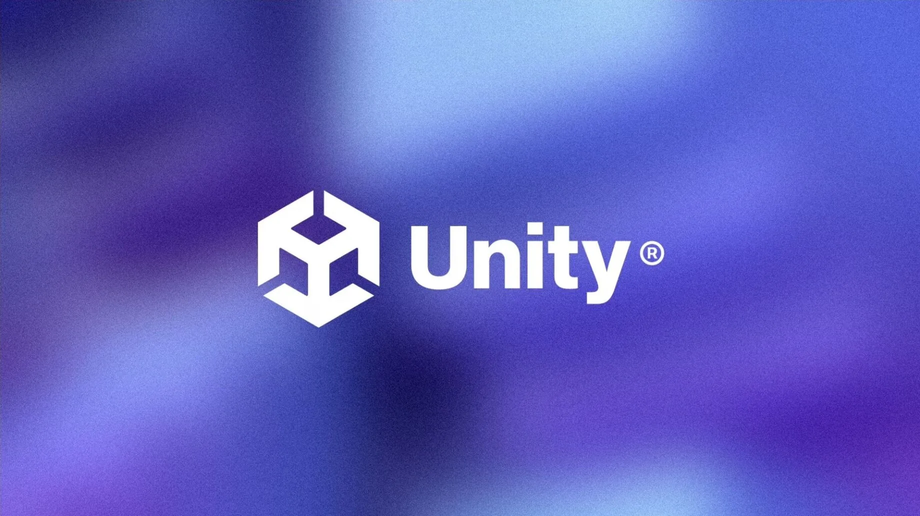 Unity 白色立方体标志在蓝紫渐变背景上的品牌视觉图，用于报道 Unity 2026 年第二季度财报